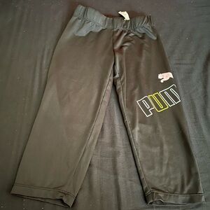 Puma Black Sweatpants with Elastic Cuffs and Relaxed Fit